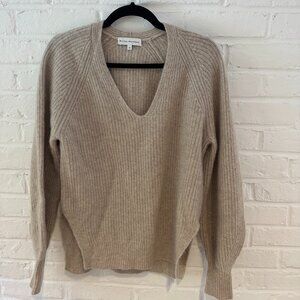White + Warren Cashmere Beige V-Neck Sweater 
Beautiful and soft. High-low hem